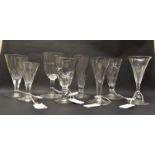 A collection of eight 18th and 19th Century conical drinking glasses of slight varying sizes,