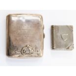 Motorcycle interest-A silver cigarette case with embossed scene of a motorcyclist,