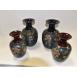 Four Langley Daisy vases,