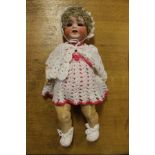 German Heubach Koppelsdorf bisque headed doll with blonde ringlet hair, open mouth, showing tongue,