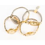 three ladies 9ct gold watches all on gilt metal expander straps with along with a gold plated