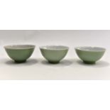 Three Chinese Celadon glazed bowls, late Qing,11cm diameter.