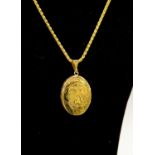 A 9ct gold locket oval locket approx 30mm x 25mm, on a herringbone chain, length approx 20'' total,