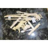 Mixed lot of ivory to include three carved cigarette holders,