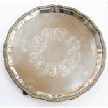 An Edwardian circular silver salver,