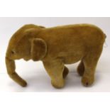 An early 1950 Steiff velour elephant (tail missing)