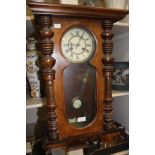 A 19th Century mahogany cased drop dial wall clock and key pendulum