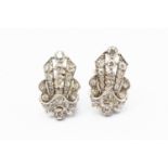 ***AUCTIONEER TO ANNOUNCE ESTIMATE CHANGE £700-800***A pair of Art Deco diamond-set platinum clips,