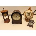 A collection of clocks including an Edwardian mantel clock and hanging example together with 1940's