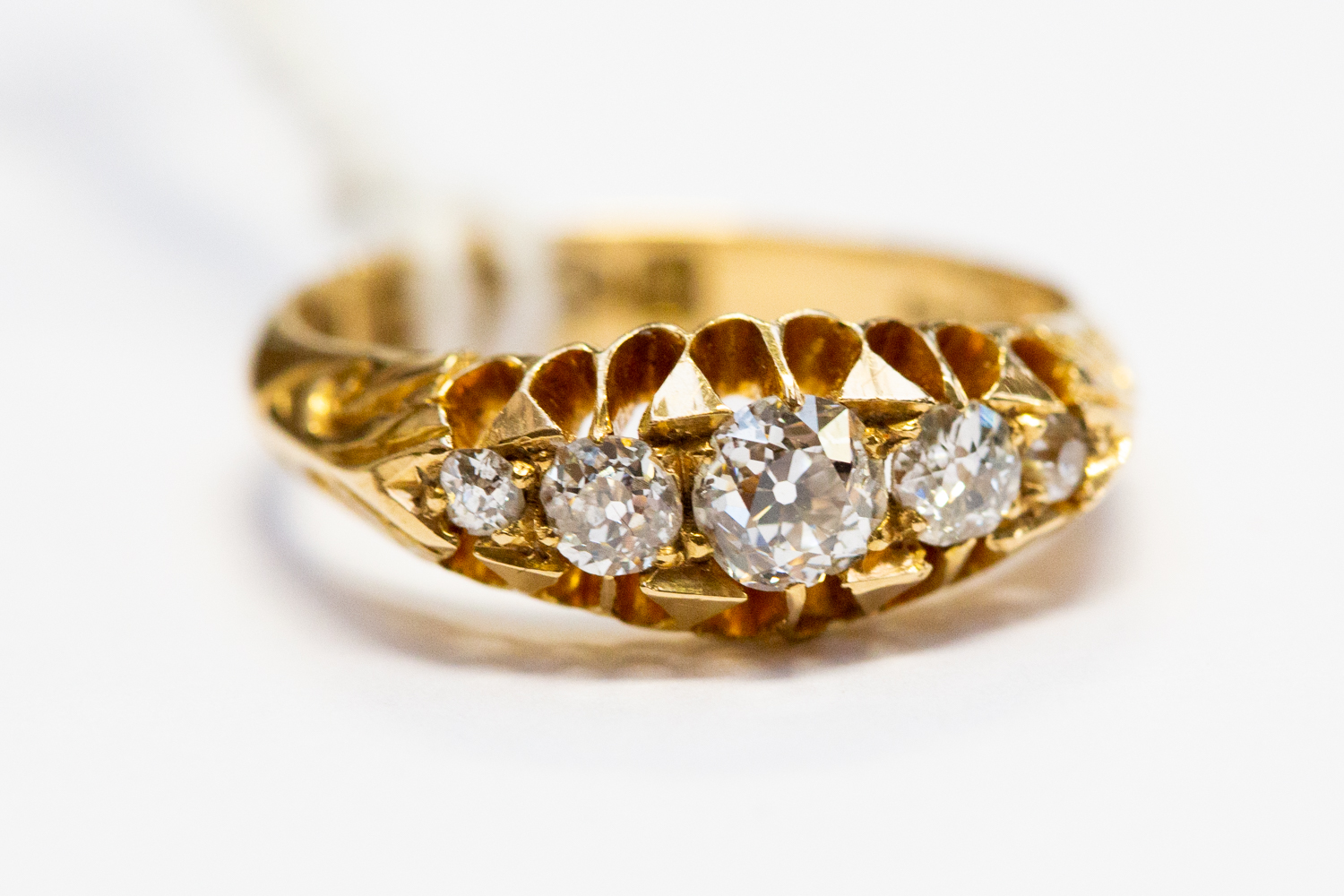 A Victorian diamond boat head ring, set with five old cut diamonds, diamond weight approx 0.