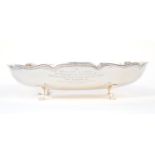 A George VI silver oval bon bon dish, wavy rim raised on four hoof feet, Lee & Wigfull, Sheffield,