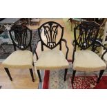 A set of six Hepplewhite style shield-back mahogany dining chairs,