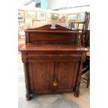 An early 19th Century mahogany chiffonier, in the Empire style, 130cm high, 102cm wide,