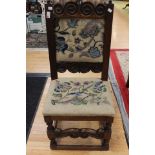 An early 20th Century Carolean style oak side chair, with an upholstered back, upholstered seat,