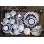 A Royal Doulton Tangier set comprising four plates, six bowls, six cups and saucers,