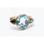 A sky blue topaz dress ring, set with a central oval blue topaz approx 9mm x 11mm,