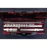 A cased Buffet Crompton flute, stamped 'Cooper' 228, Paris.