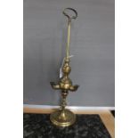 A late 19th Century early 20th Century (Edwardian) portable oil lamp,