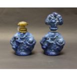 A Victorian blue deeply pressed glass perfume bottle and stopper,