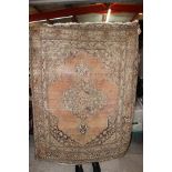 Large fawn rug with geometric patterns