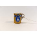 A miniature Coalport china mug,