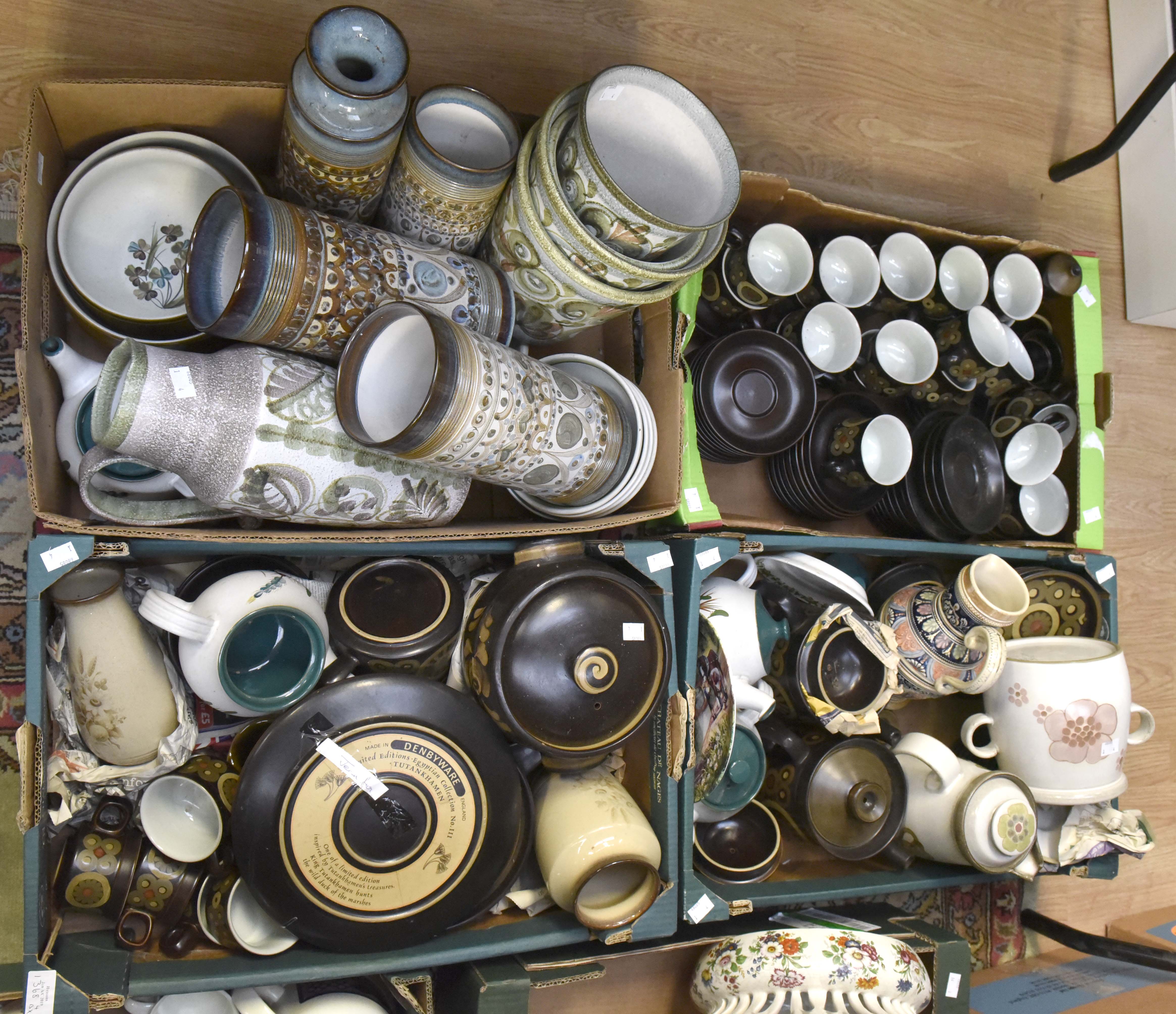 A large collection of Denby Pottery dinner wares including coffee sets