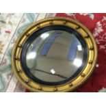 A Regency Revival gilt wood convex mirror