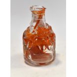 A Peter Layton Studio glass bottle shaped vase, with orange inclusions and swirling sides,