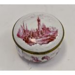 A 19th Century trivet round box with pink scenes Continental