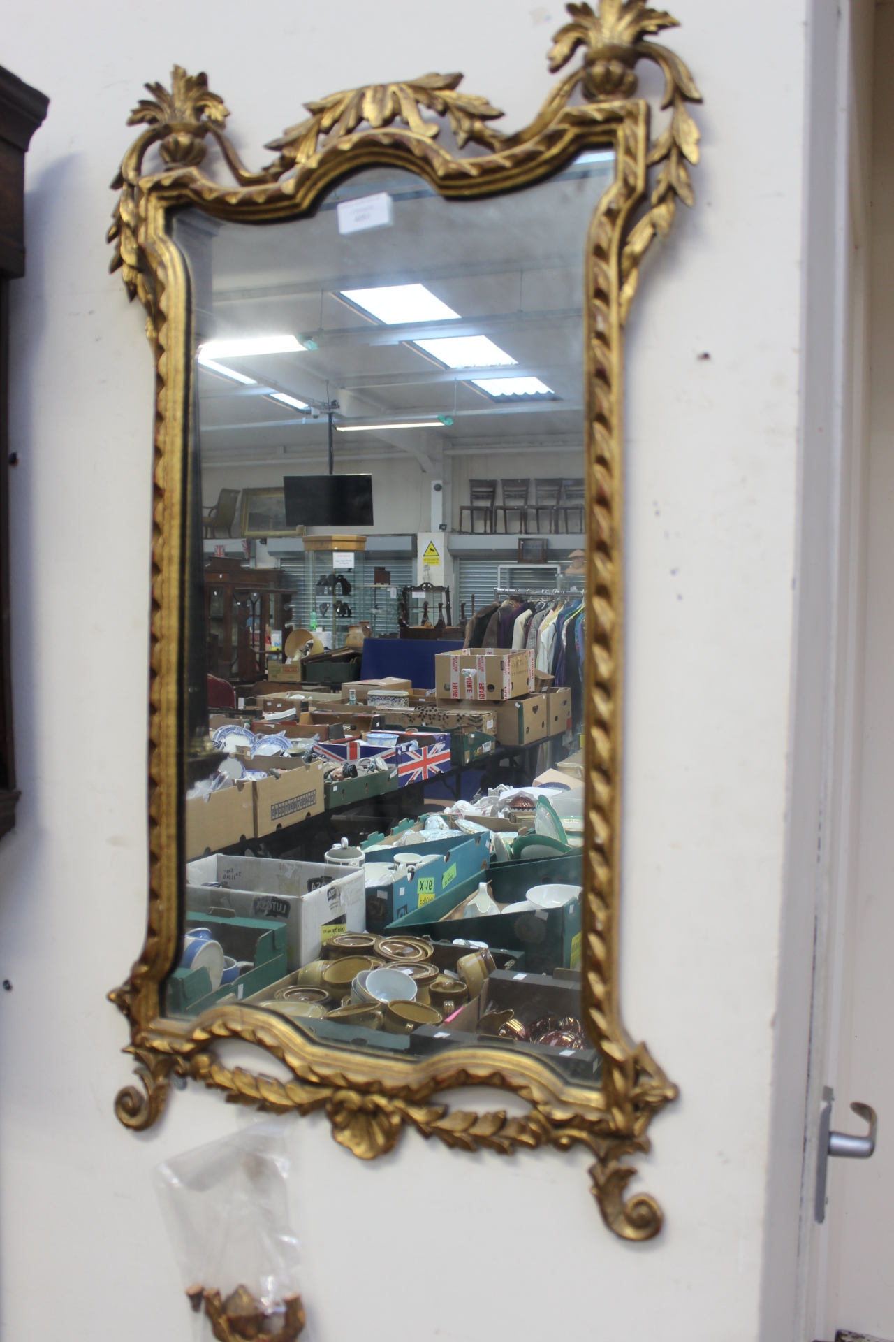 A modern giltwood framed wall mirror,