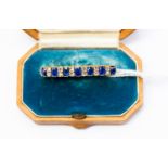 A late 19th/early 20th century sapphire and diamond gold bar brooch,