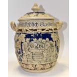 Stoneware embossed twin handled Christmas jar probably Rumtopf with German inscription to rim