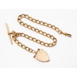 A 9 ct gold Albert chain and shield locket fob, length approx 13'', total gross weight approx 39.