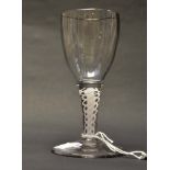 A late 18th early 19th Century port glass, the stem with a double spiral twist stem,