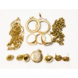 A collection of 9ct gold jewellery and unmarked yellow metal to include two chains, three rings,