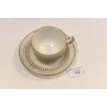 Sevres cup and saucer with pierced lattice white ground with gilt decoration, A/F,