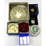Royal Mint paperweights with silver and coins,