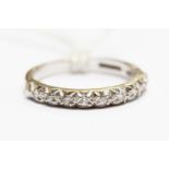 A diamond half set eternity ring,