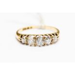 A diamond five stone 18 carat yellow gold ring,