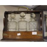 Edwardian EPNS mounted three bottle tantalus