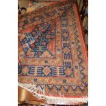 Very large multi-coloured rug with geometric pattern