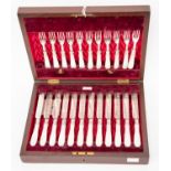 Set of mother of pearl handled silver fruit knives and forks, blades & tines hallmarked,