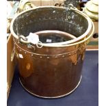 A copper coal bucket, having brass handle,