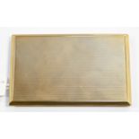 A 9ct gold cigarette case, machine engraved, size approx 135mm x 85mm, London hallmark, inscribed J.