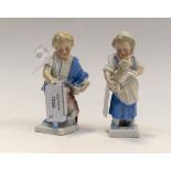 Early 19th Century probably German blue and white hard paste porcelain boy and girl figures,