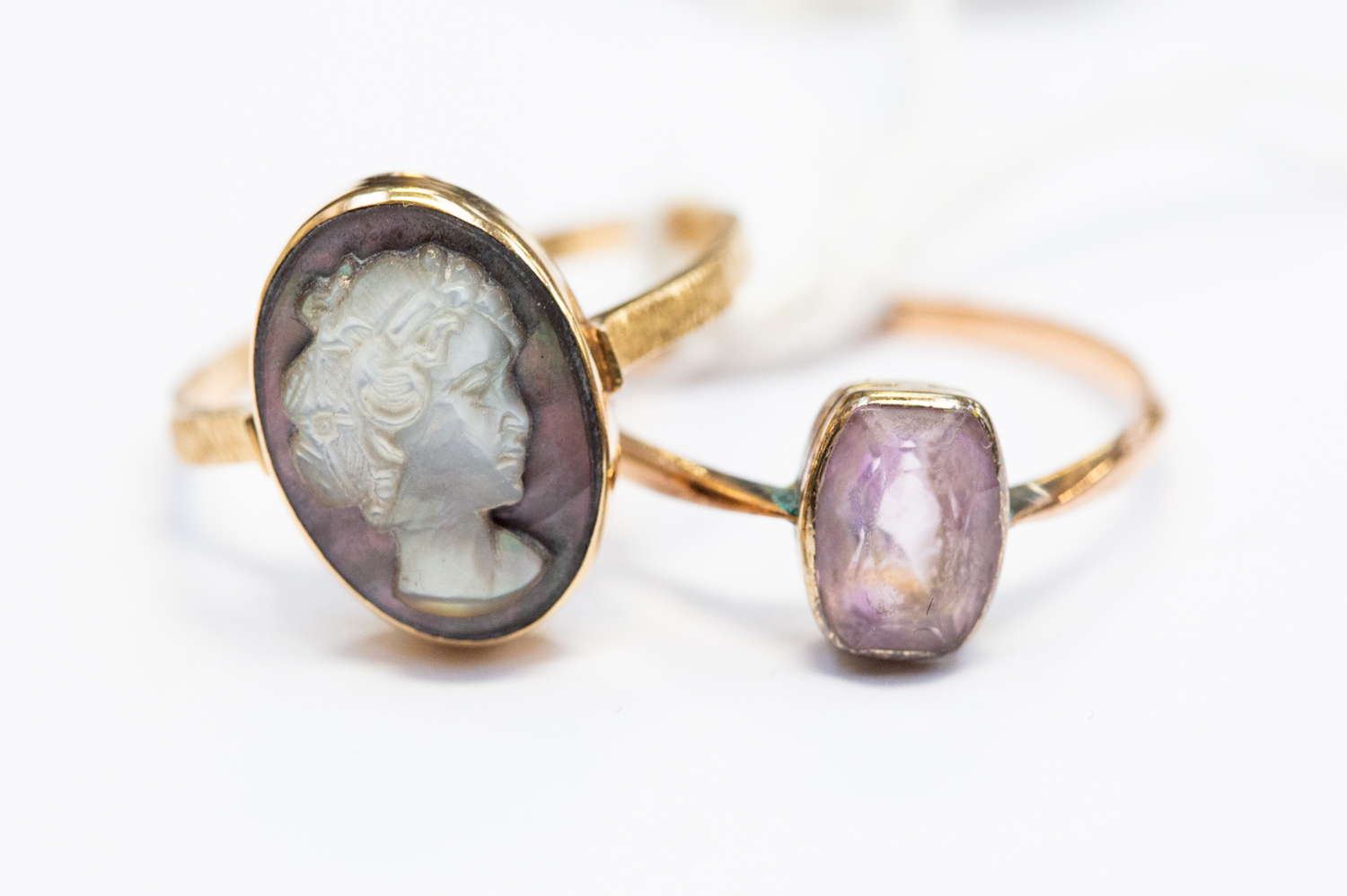 A cameo style ring set in 14ct gold, size P along with an amethyst and 9ct gold ring, sized P,