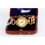 Edwardian 9ct gold lady's wristwatch with enamelled dial with seed pearl set bezel,