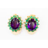 A pair of 18ct yellow gold, amethyst and emerald earring clips,