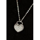 Cartier, a diamond set 18ct white gold heart pendant and chain,