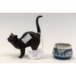 A Wedgwood black basalt figure of a cat, having glass eyes,